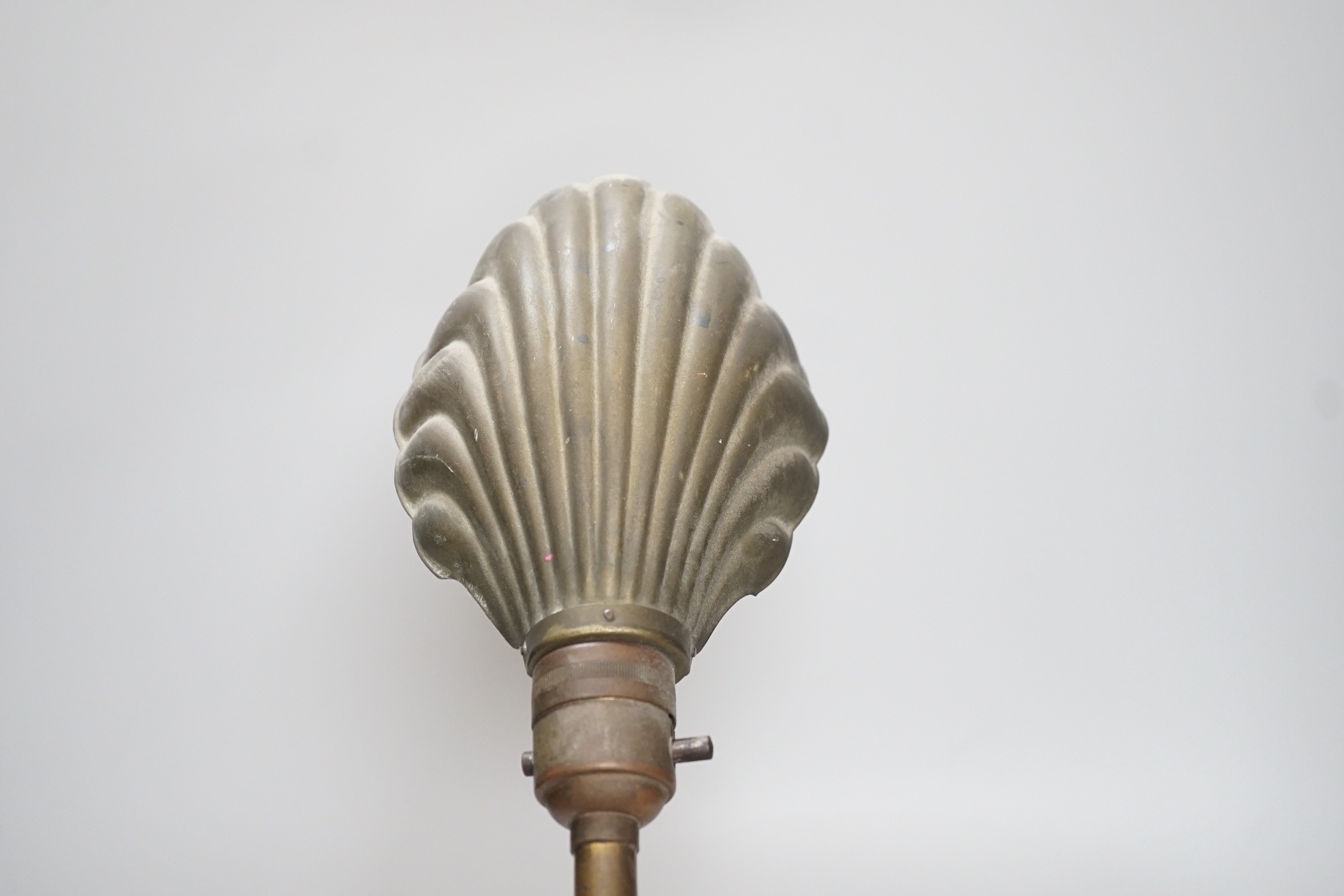 An Edwardian brass adjustable ‘shell’ desk lamp